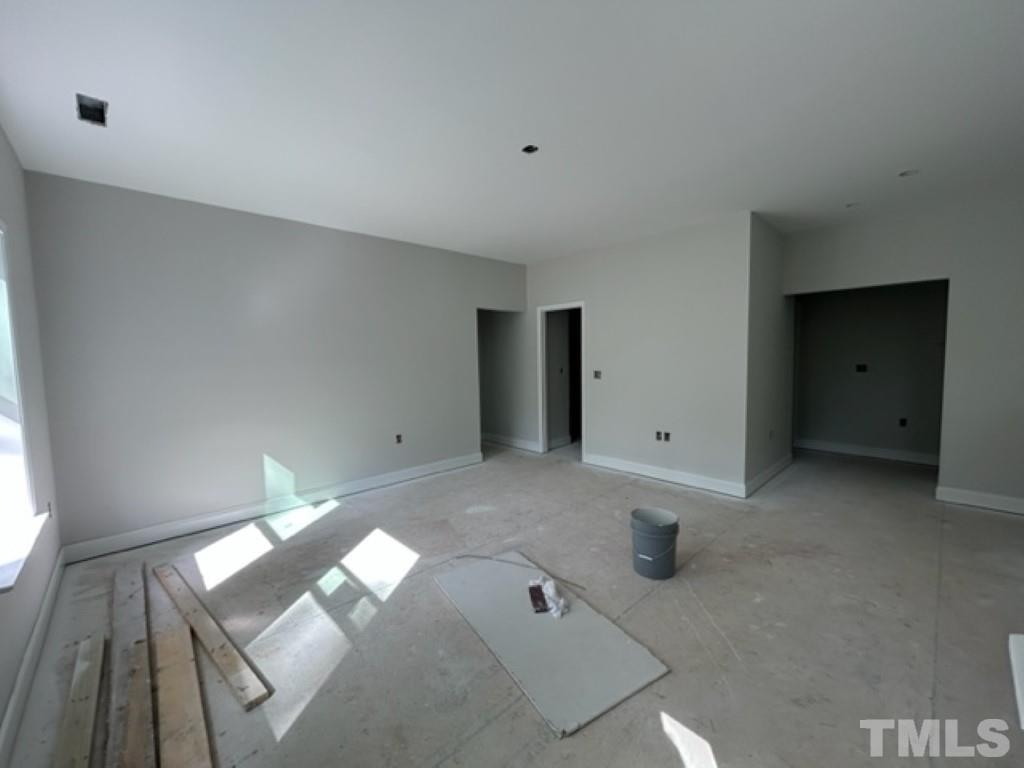 115 Cackling Way Zebulon, NC 27597 - Photo 11 of 44 a view of an empty room