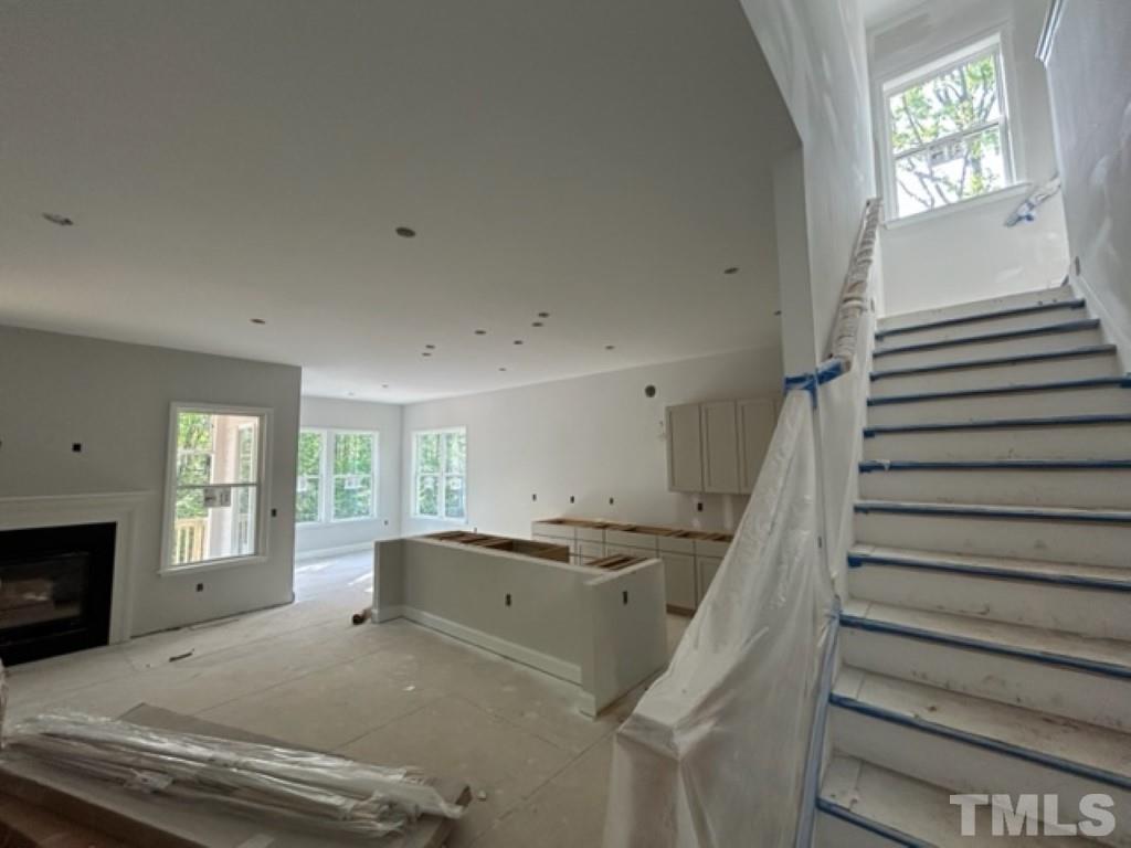 115 Cackling Way Zebulon, NC 27597 - Photo 13 of 44 a view of entryway and hall with wooden floor