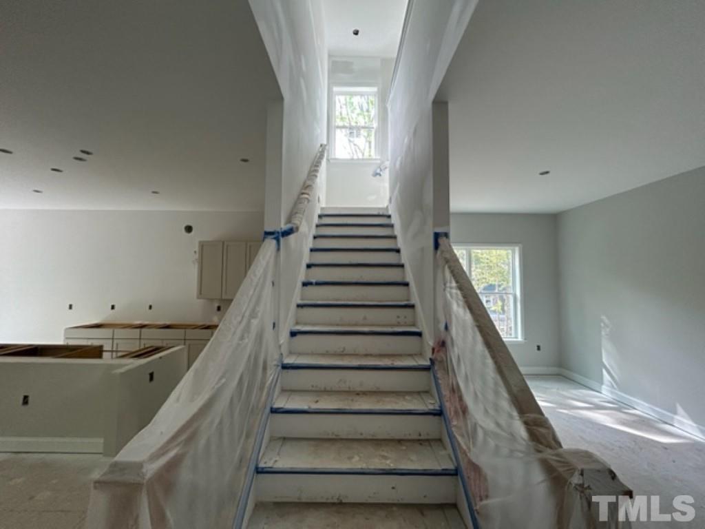 115 Cackling Way Zebulon, NC 27597 - Photo 14 of 44 a view of entryway and hall with wooden floor