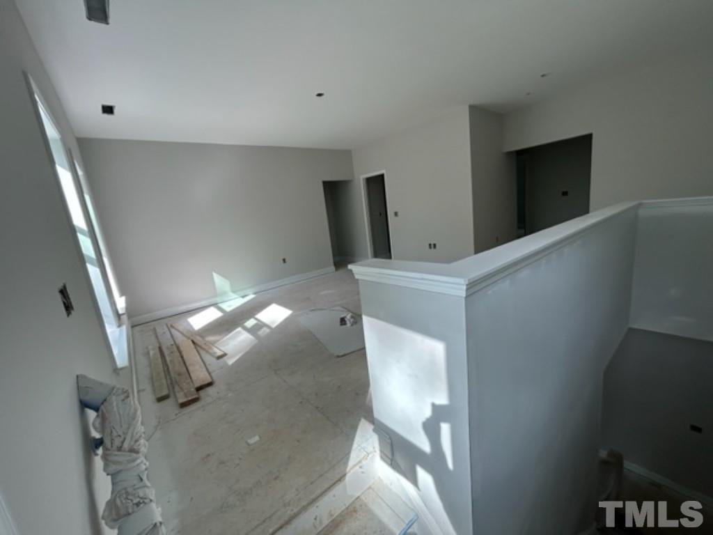 115 Cackling Way Zebulon, NC 27597 - Photo 28 of 44 a view of staircase with wooden floor