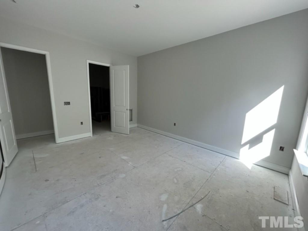 115 Cackling Way Zebulon, NC 27597 - Photo 30 of 44 a view of an empty room