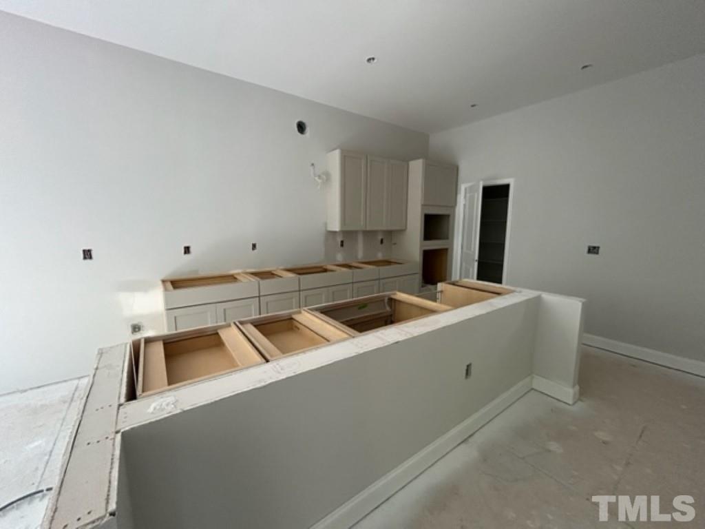 115 Cackling Way Zebulon, NC 27597 - Photo 6 of 44 a utility room with dryer and washer