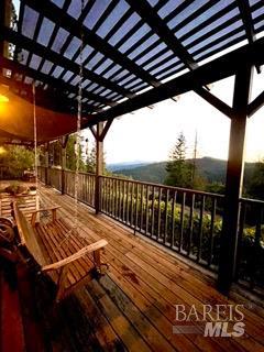 a view of balcony with wooden floor