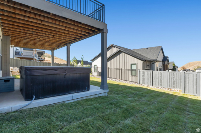 1711 West Canyon Rim Road North Lehi, UT 84048 - Photo 29 of 31 Under-deck patio area with a built-in hot tub
