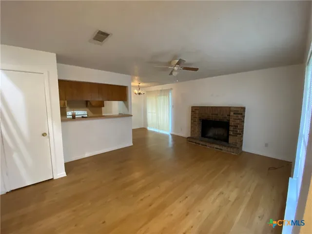 a view of a livingroom with a fireplace
