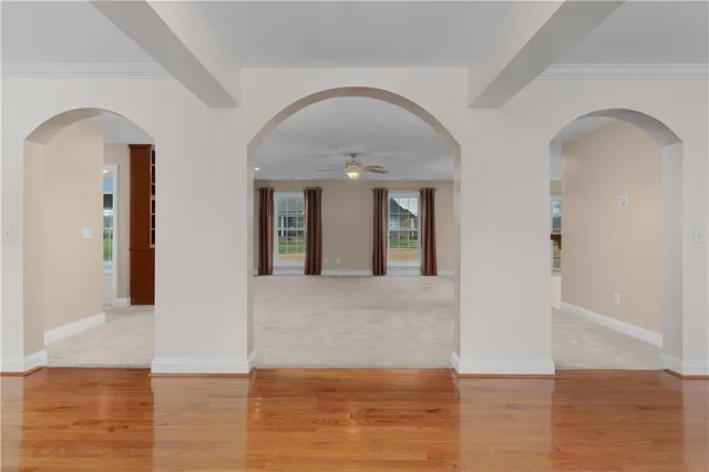 a view of entryway with wooden floor