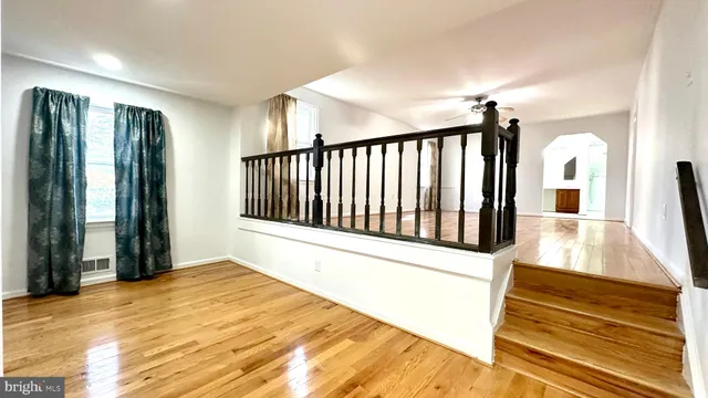 a view of a room with wooden floor and floors