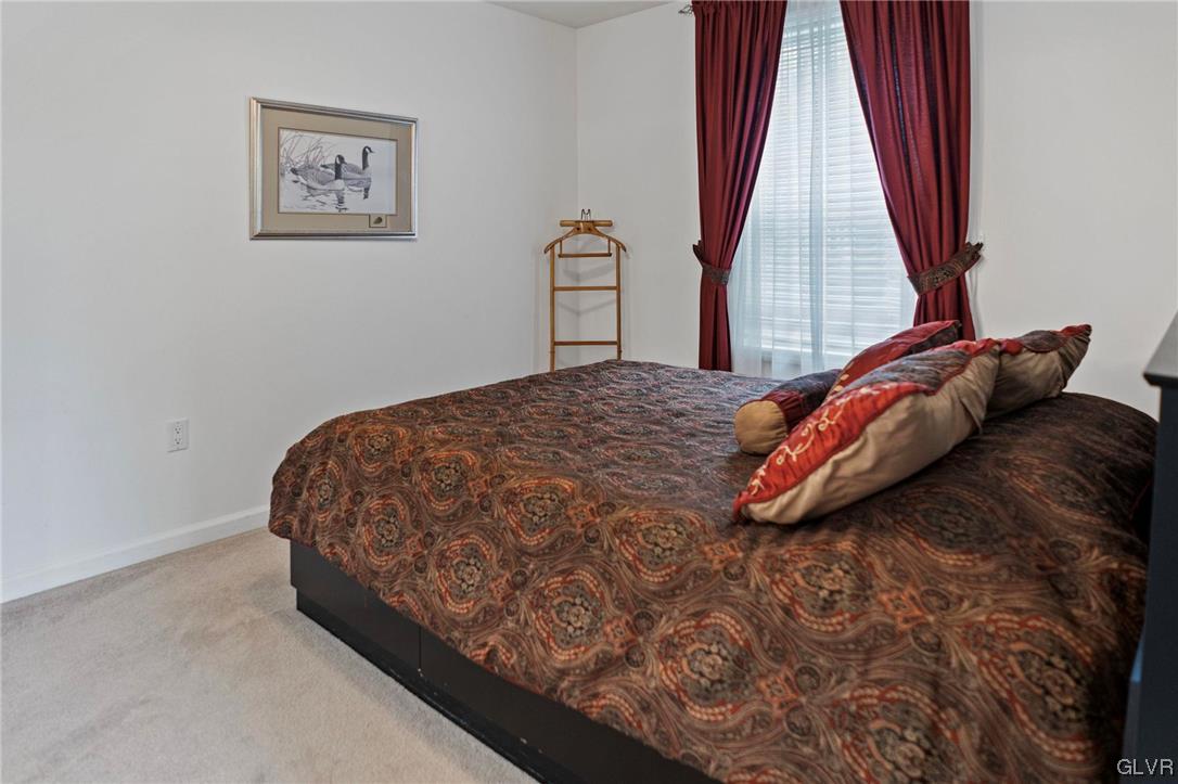 106 Stoney Creek Road Jim Thorpe, PA 18229 - Photo 12 of 50 a bedroom with a bed and a window