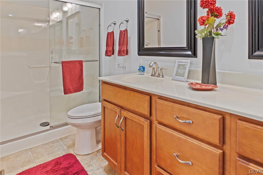 106 Stoney Creek Road Jim Thorpe, PA 18229 - Photo 15 of 50 a bathroom with a sink vanity mirror and toilet