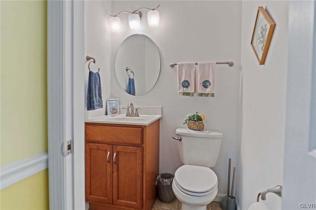 106 Stoney Creek Road Jim Thorpe, PA 18229 - Photo 16 of 50 a bathroom with a toilet a sink and a mirror