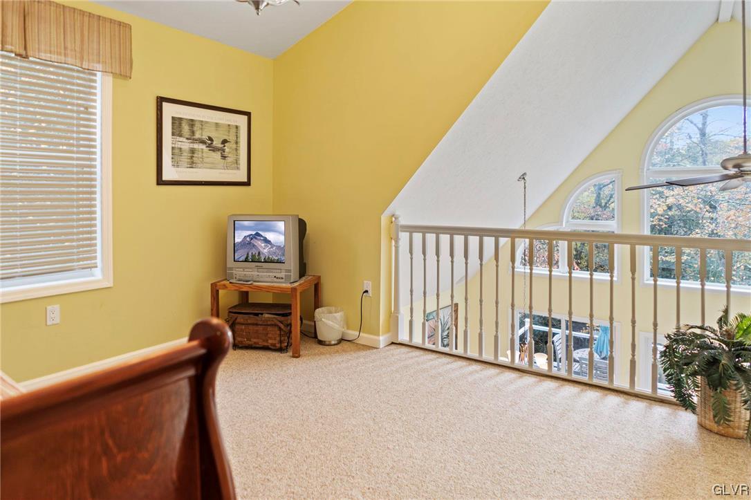106 Stoney Creek Road Jim Thorpe, PA 18229 - Photo 18 of 50 a view of a bedroom with furniture and windows