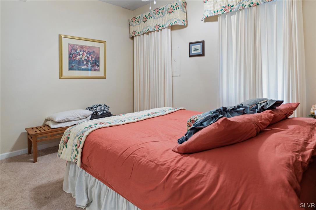 106 Stoney Creek Road Jim Thorpe, PA 18229 - Photo 27 of 50 a bedroom with a bed and a chair
