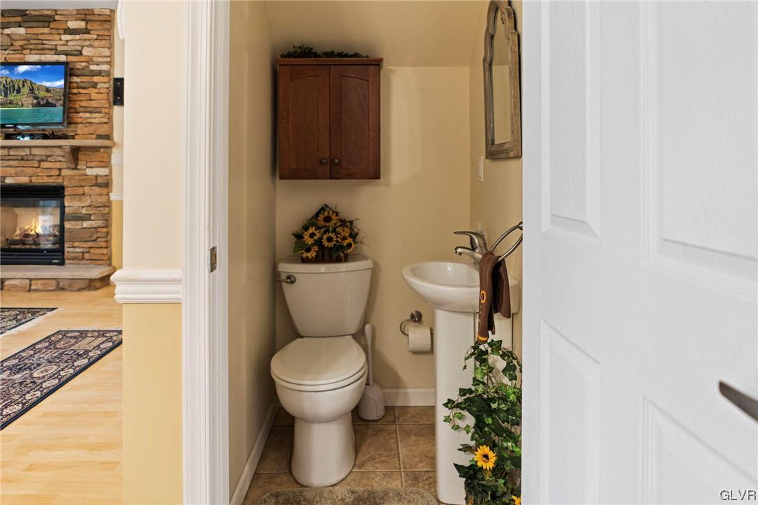 106 Stoney Creek Road Jim Thorpe, PA 18229 - Photo 30 of 50 a white toilet sitting next to a bathroom sink