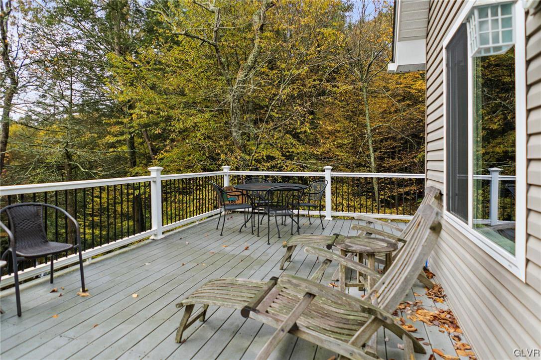 106 Stoney Creek Road Jim Thorpe, PA 18229 - Photo 32 of 50 a view of a roof deck with wooden floor and fence