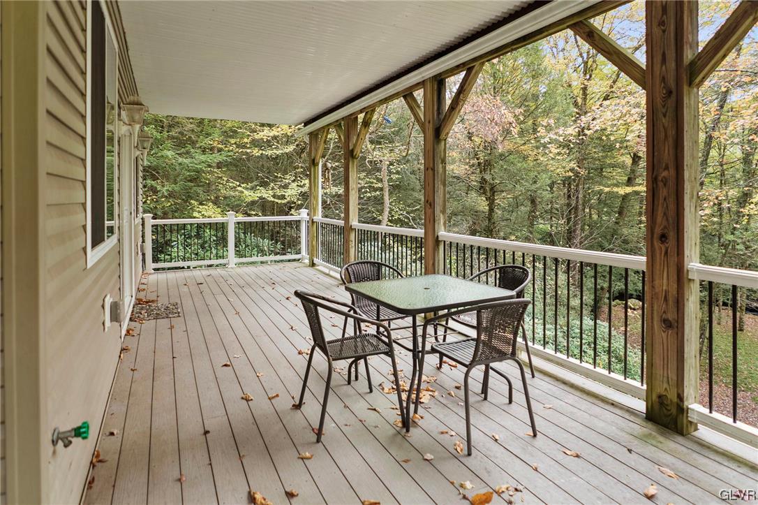 106 Stoney Creek Road Jim Thorpe, PA 18229 - Photo 33 of 50 a view of balcony with furniture and wooden floor