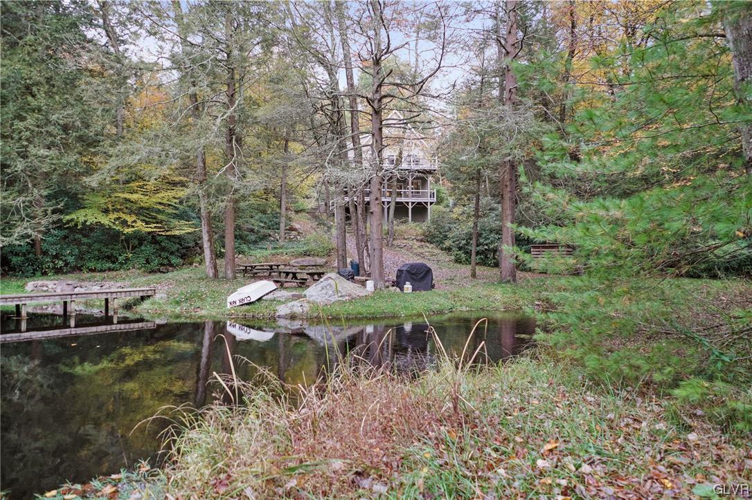 106 Stoney Creek Road Jim Thorpe, PA 18229 - Photo 46 of 50 a view of a backyard with sitting area
