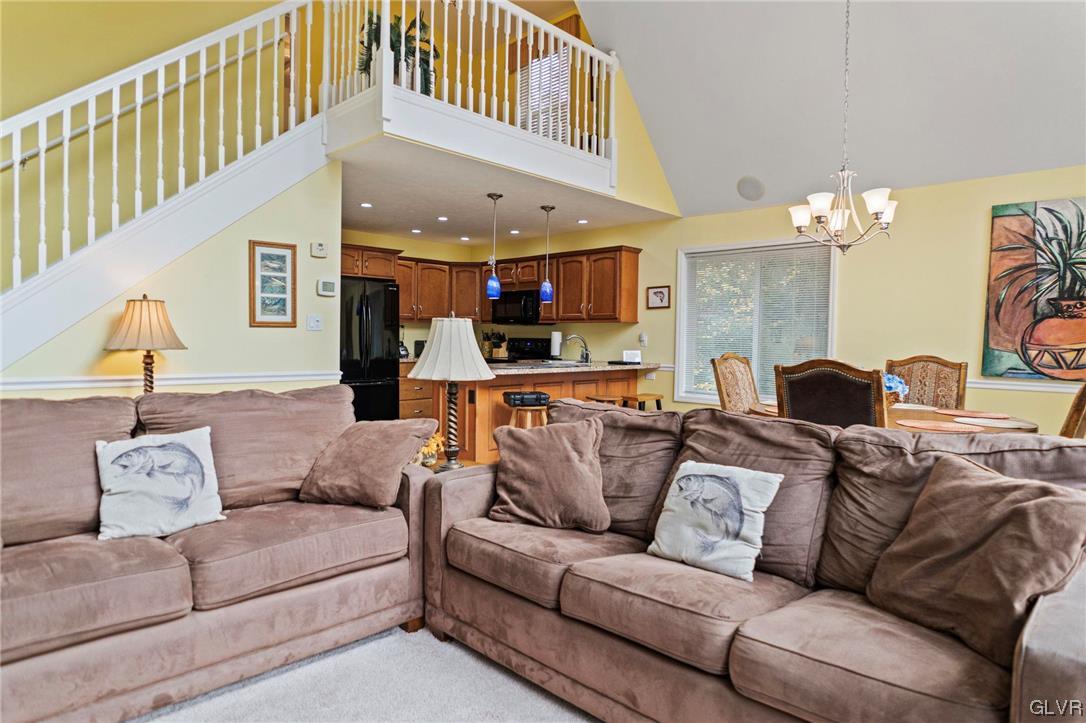106 Stoney Creek Road Jim Thorpe, PA 18229 - Photo 7 of 50 a living room with furniture and a fireplace