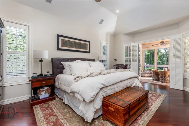 a bedroom with furniture a bed and a couch