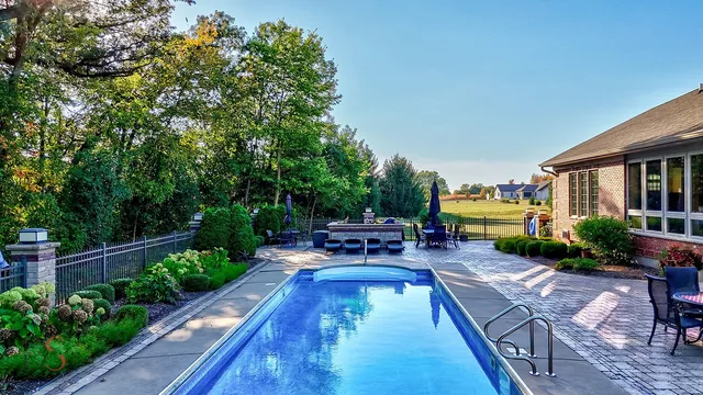 a house view with a sitting space and garden space