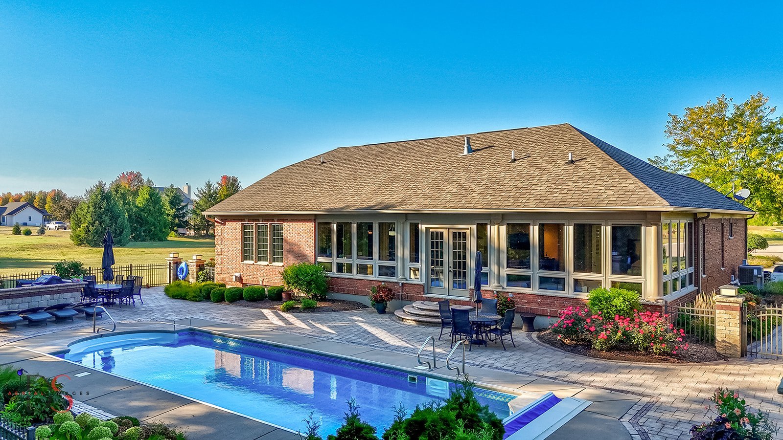 2951 East 1489th Road Ottawa, IL 61350 - Photo 47 of 55 a view of a house with backyard sitting area and swimming pool