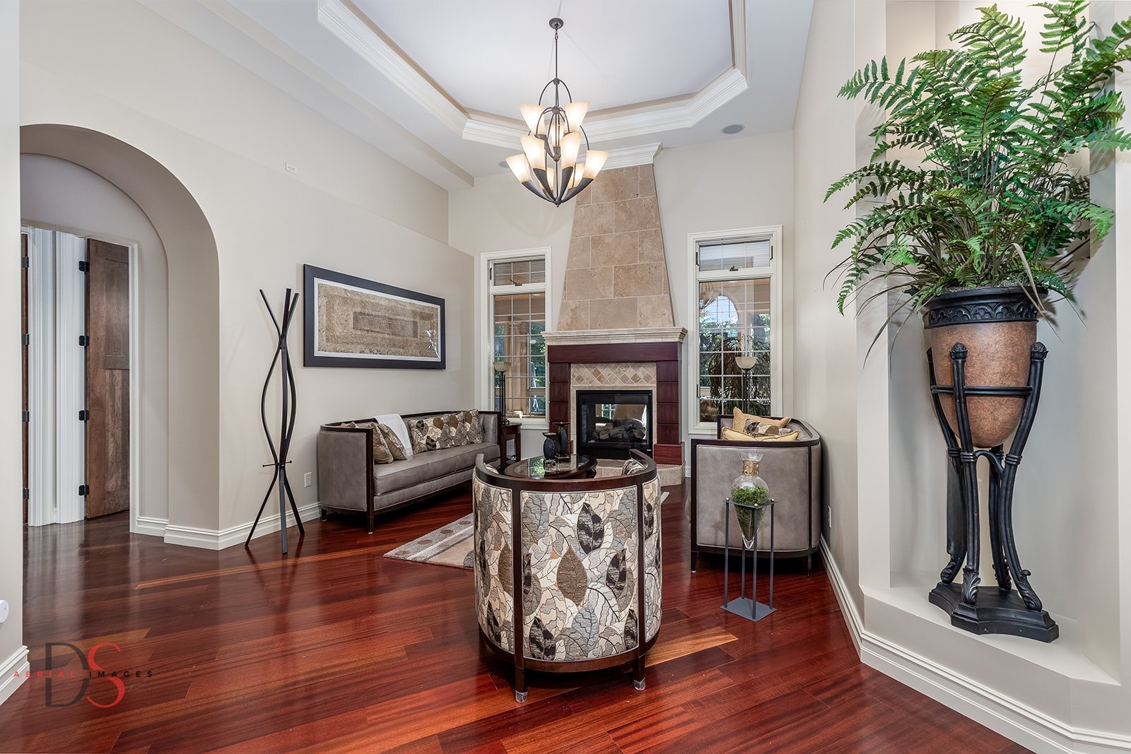 2951 East 1489th Road Ottawa, IL 61350 - Photo 8 of 55 a living room with furniture a fireplace and a potted plant