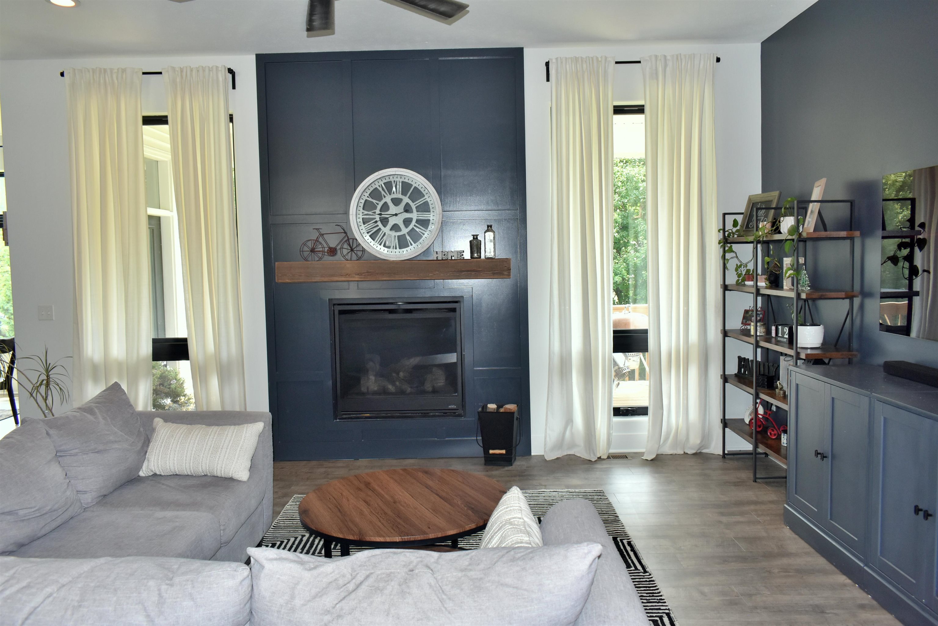 12029 Granite Court Rockton, IL 61072 - Photo 12 of 28 a living room with furniture and a fireplace