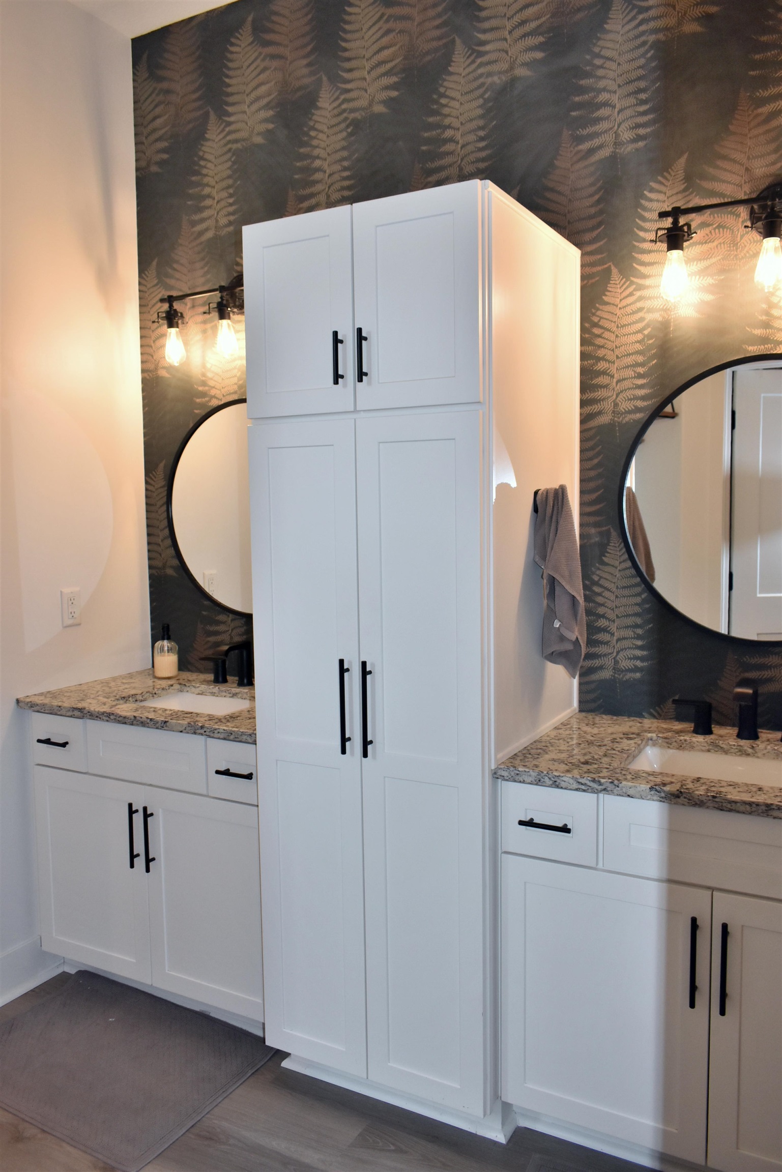 12029 Granite Court Rockton, IL 61072 - Photo 17 of 28 a bathroom with a sink and mirror