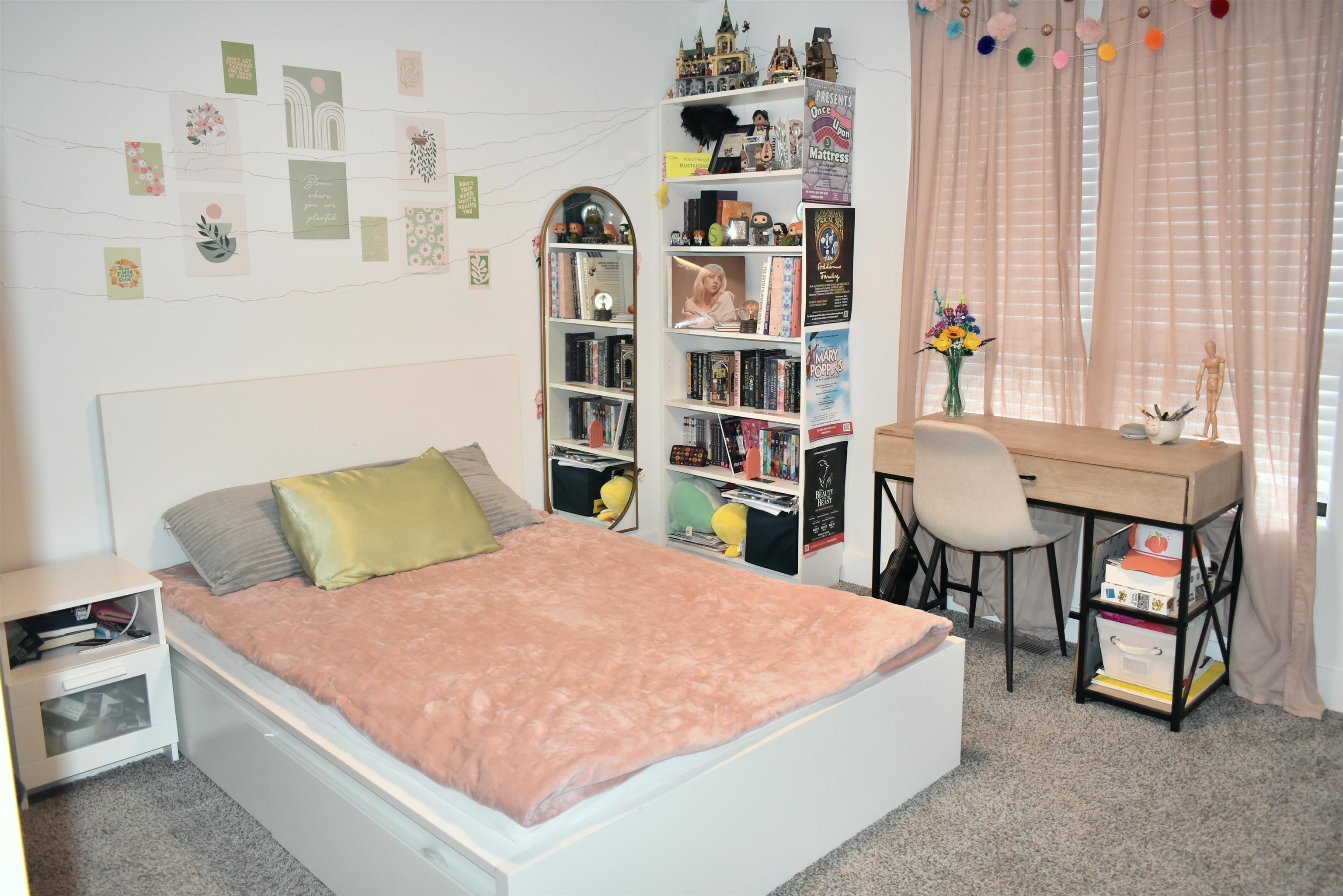 12029 Granite Court Rockton, IL 61072 - Photo 21 of 28 a living room with a bed and a bookshelf