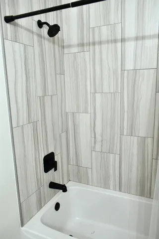 a bathroom with a sink and a shower