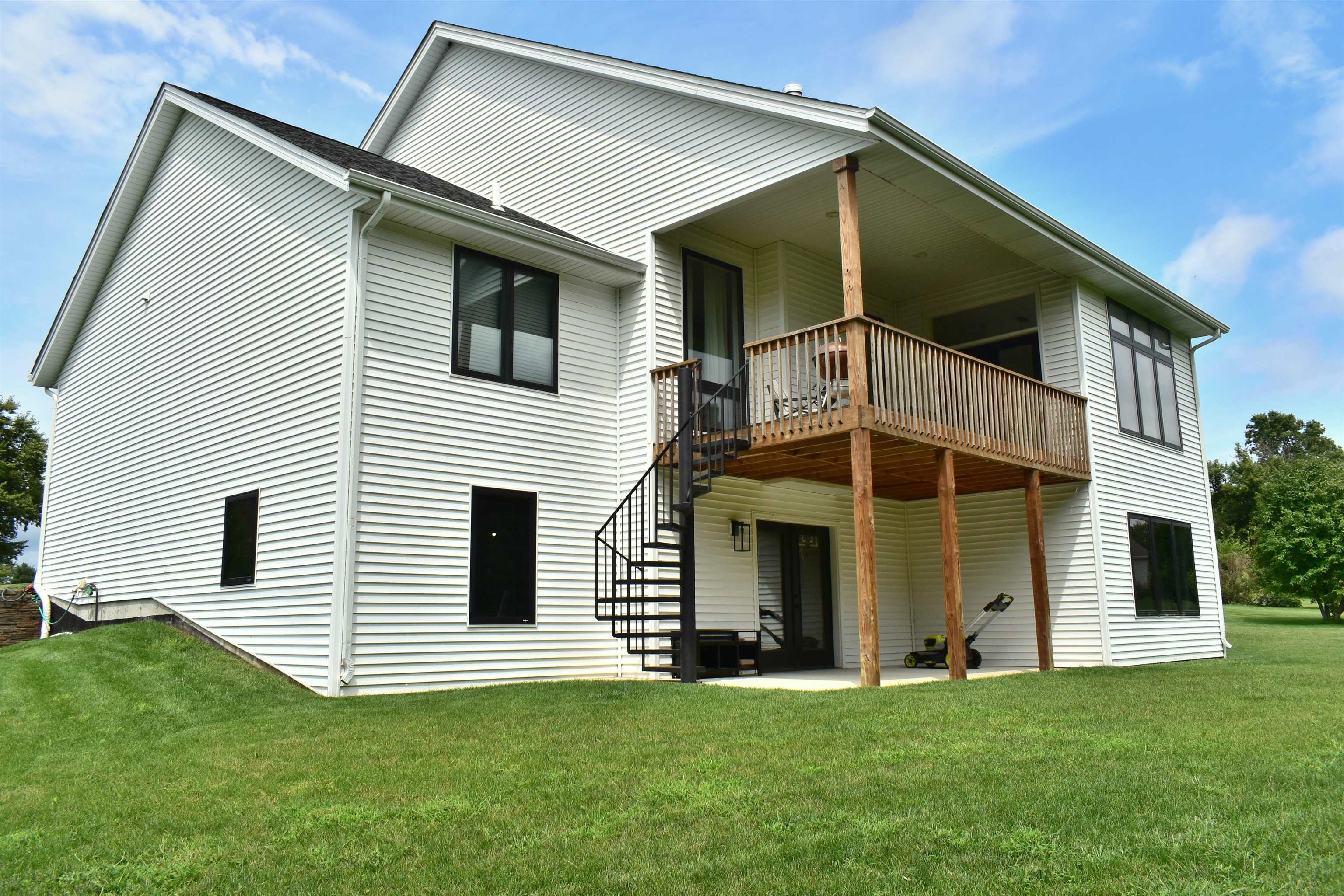 12029 Granite Court Rockton, IL 61072 - Photo 27 of 28 a view of a house with a yard