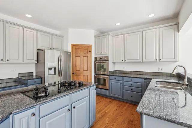 a view of an entryway with floor to ceiling windows