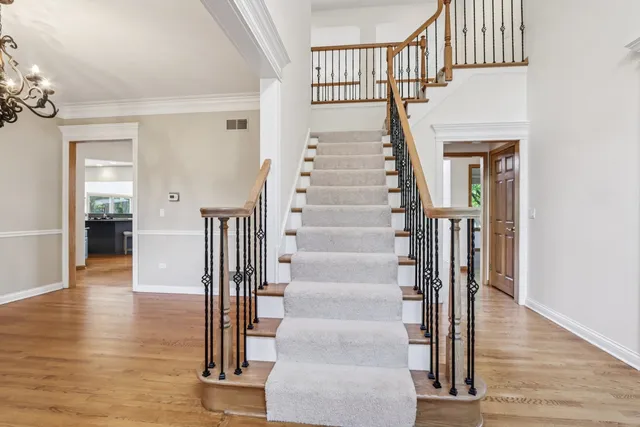a view of an entryway with a chandelier
