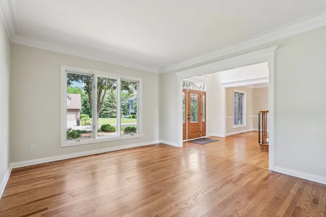 a view of entryway with wooden floor