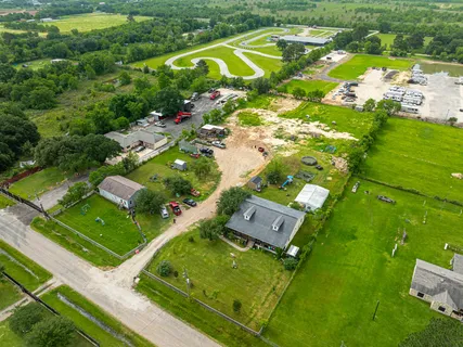 an aerial view of a pool yard swimming pool and outdoor seating