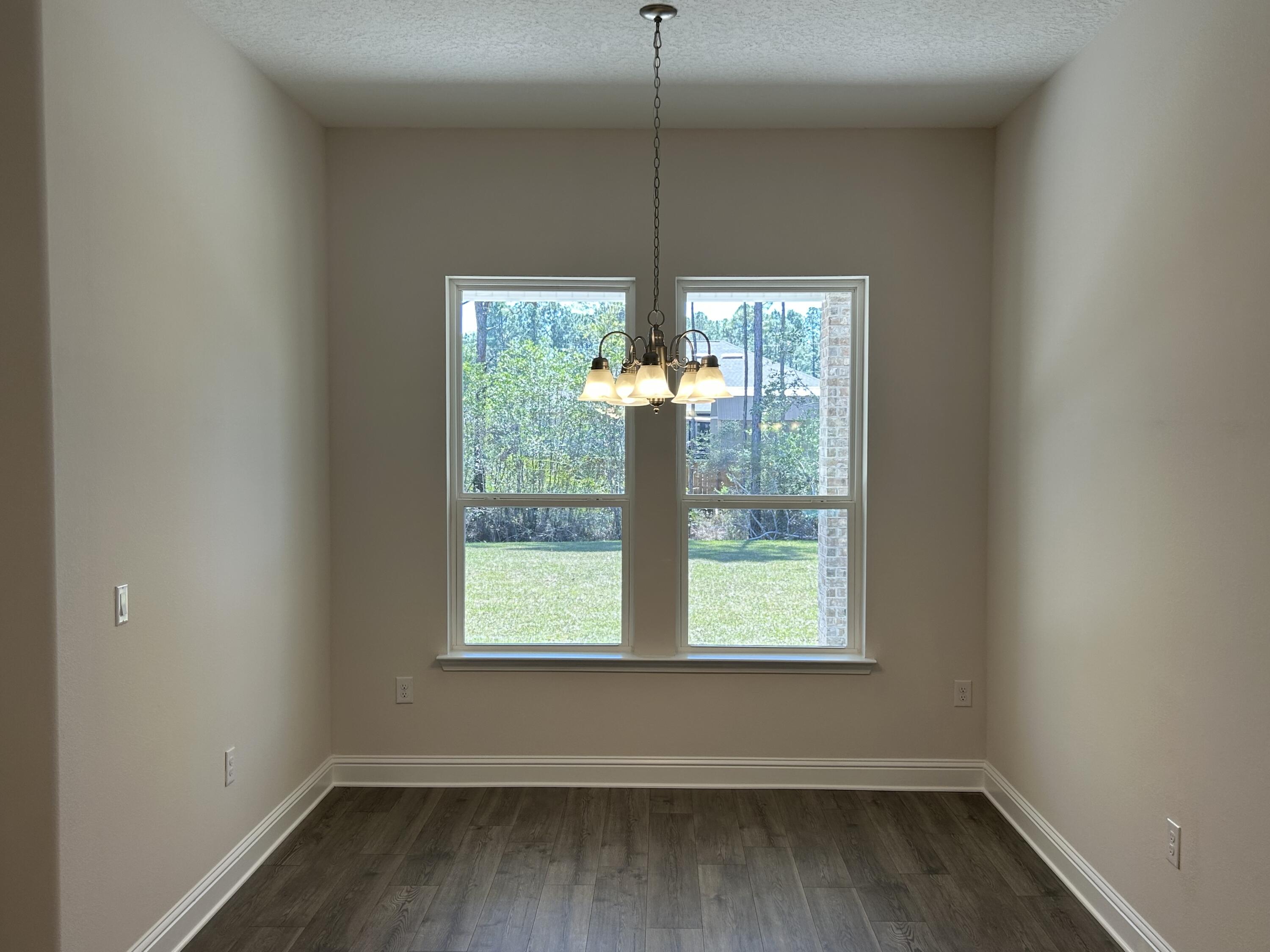 6615 Angle Road, Unit HBTS 5112 Navarre, FL 32566 - Photo 17 of 36 an empty room with a window