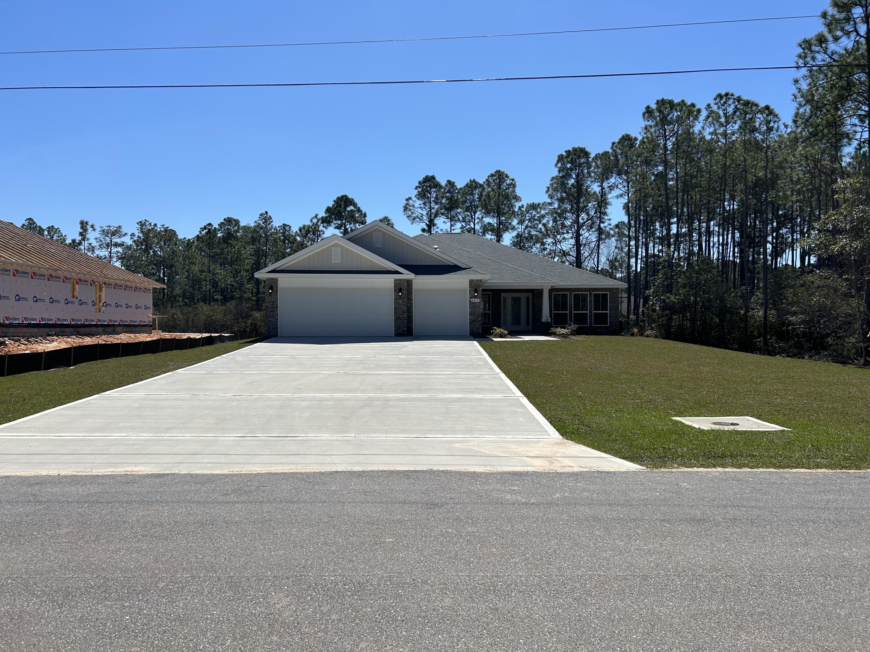 6615 Angle Road, Unit HBTS 5112 Navarre, FL 32566 - Photo 2 of 36 a view of swimming pool with outdoor seating and yard