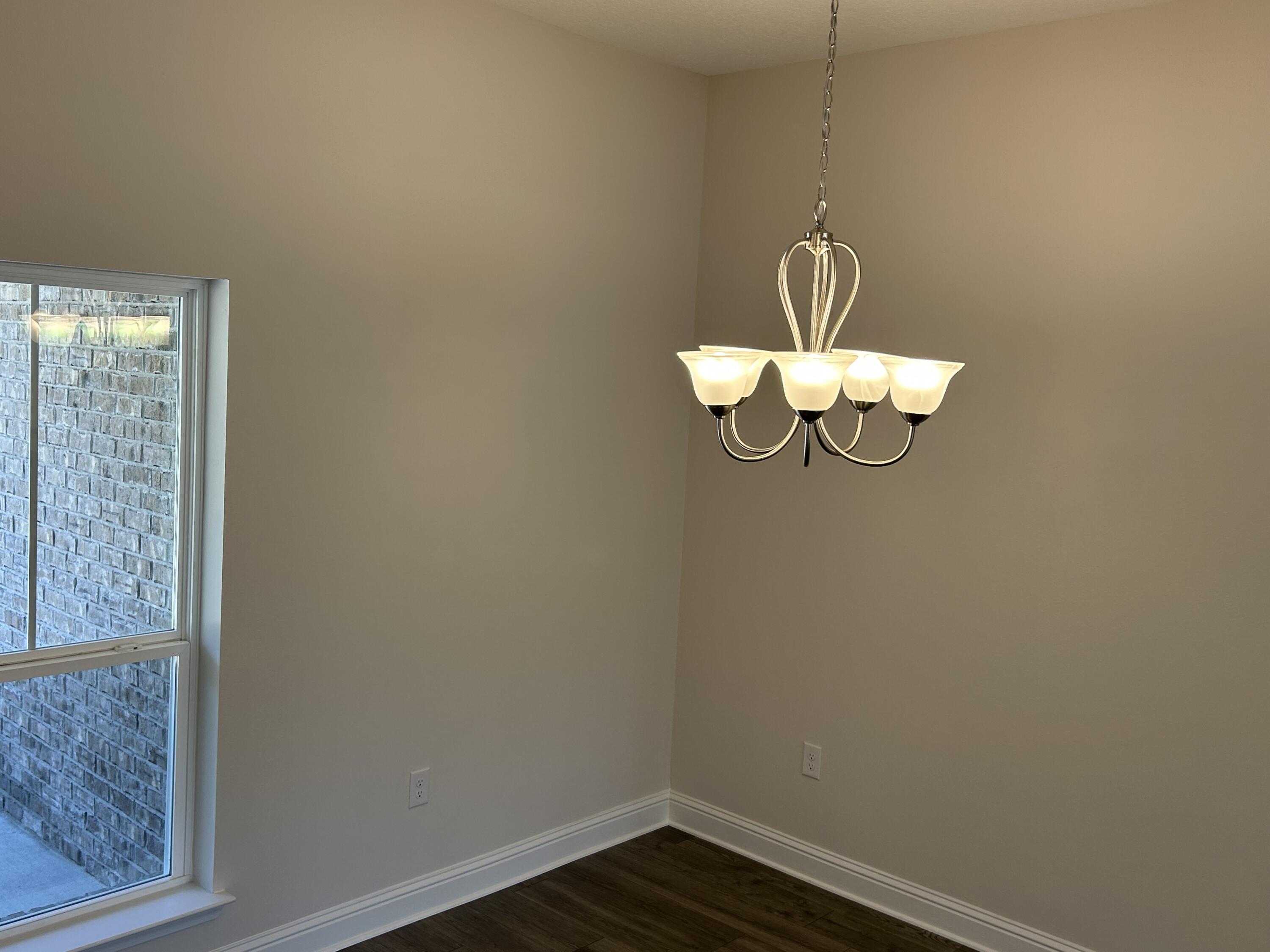 6615 Angle Road, Unit HBTS 5112 Navarre, FL 32566 - Photo 9 of 36 a white wall with a window