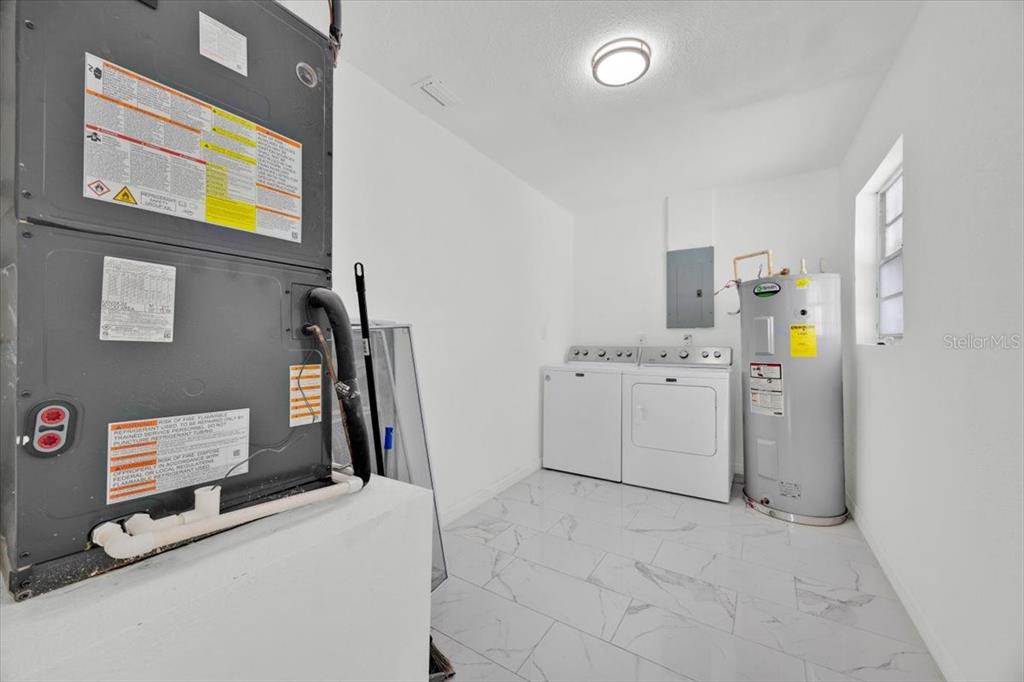 2930 Rio Lane Orlando, FL 32805 - Photo 21 of 28 a view of utility room