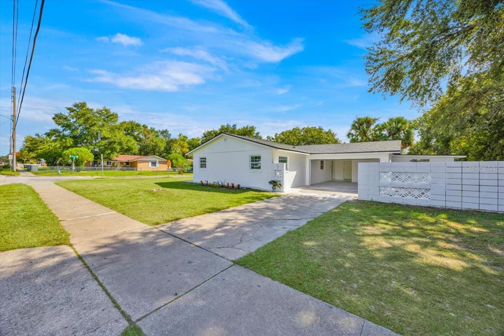 2930 Rio Lane Orlando, FL 32805 - Photo 28 of 28 a view of a house with a yard