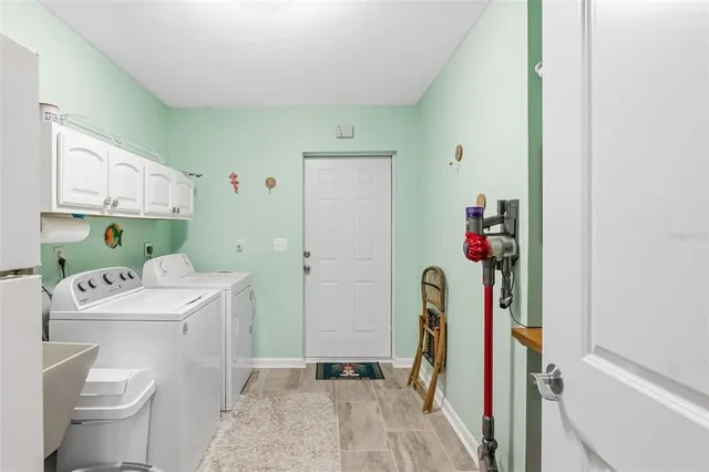 a white toilet sitting next to a window