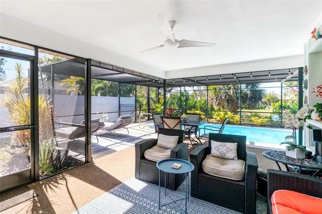 a bedroom with furniture and a bathtub