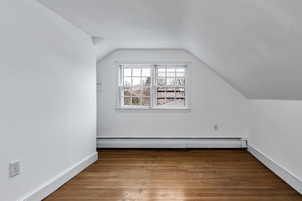 396 Oak Street Methuen, MA 01844 - Photo 26 of 42 a view of a room with wooden floor and window