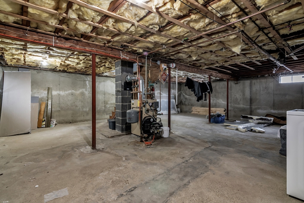 396 Oak Street Methuen, MA 01844 - Photo 40 of 42 a view of a room with gym equipment