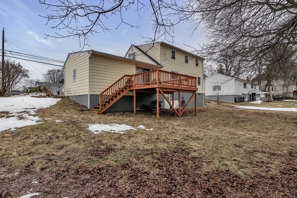 396 Oak Street Methuen, MA 01844 - Photo 41 of 42 a view of a house with a yard