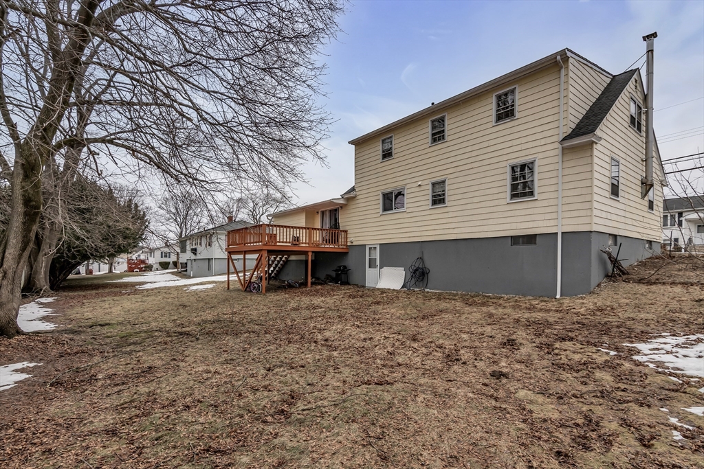 396 Oak Street Methuen, MA 01844 - Photo 42 of 42 a house that has a tree in front of it