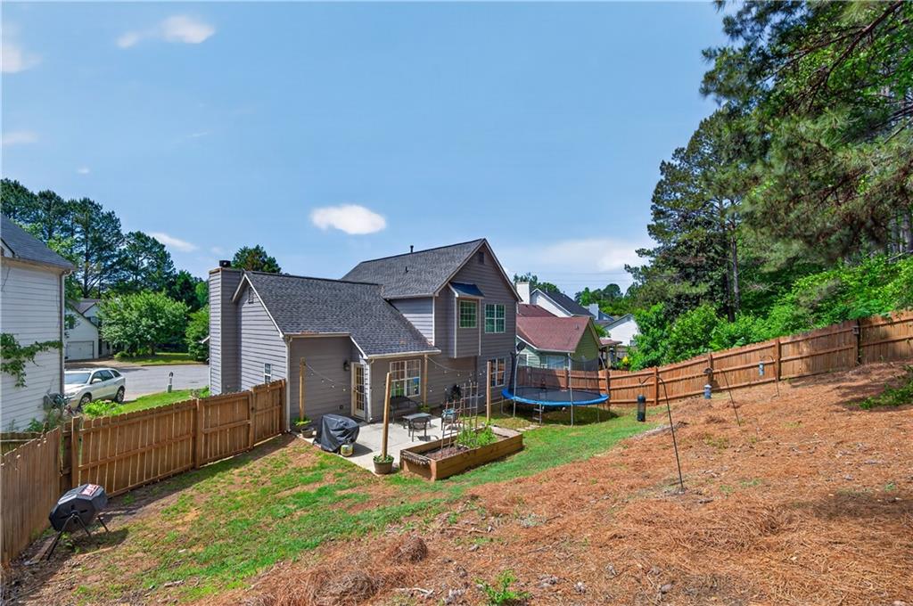 3904 Keystone Ridge Acworth, GA 30101 - Photo 13 of 45 a view of a house with a yard porch and sitting area