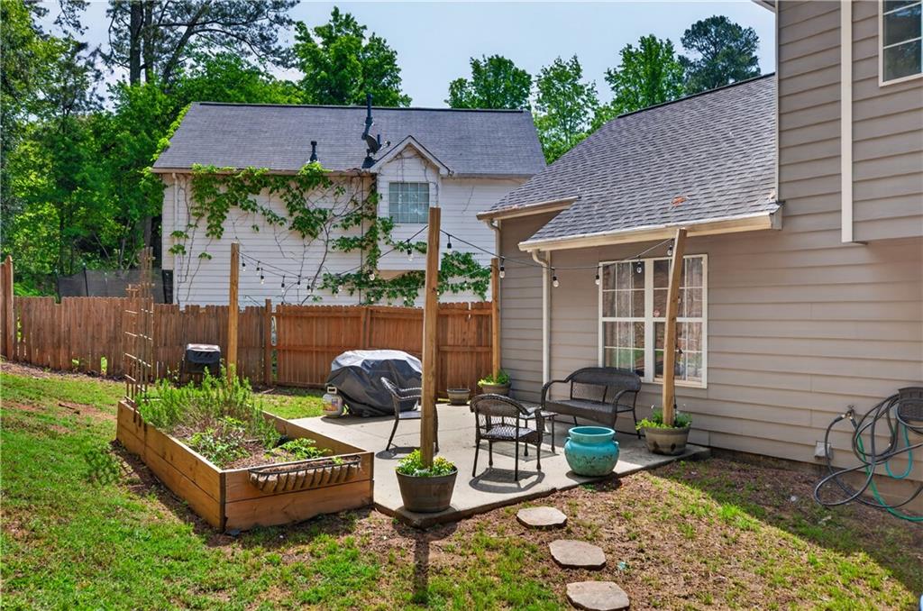 3904 Keystone Ridge Acworth, GA 30101 - Photo 16 of 45 a backyard of a house with seating space