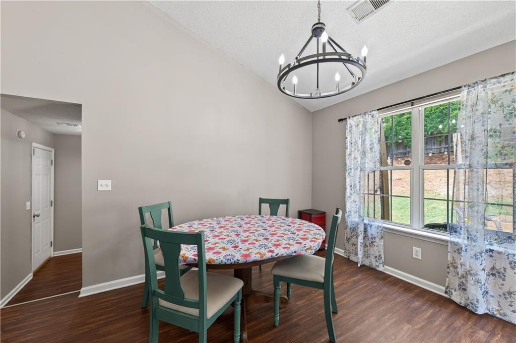 3904 Keystone Ridge Acworth, GA 30101 - Photo 35 of 45 a view of a dining room with furniture window and wooden floor