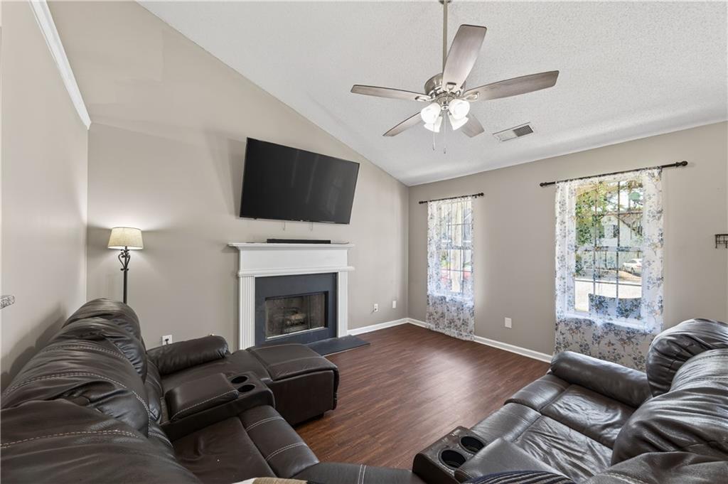 3904 Keystone Ridge Acworth, GA 30101 - Photo 37 of 45 a living room with furniture and a fireplace