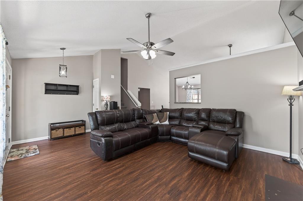 3904 Keystone Ridge Acworth, GA 30101 - Photo 39 of 45 a living room with furniture and a wooden floor